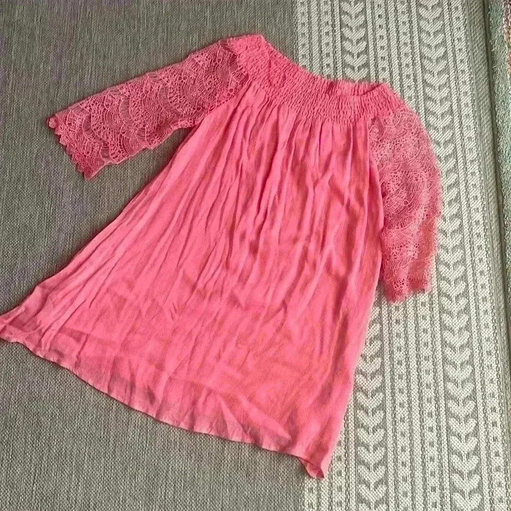 Peachy pink muslin and lace style dress